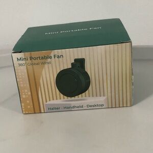 Mini portable fan powerful airflow  with 3 speed adjustable and clip on white.